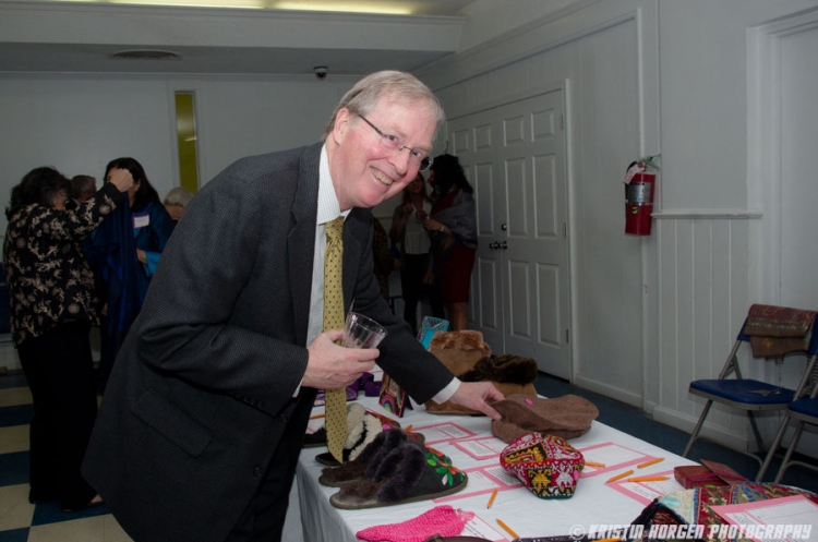 Guests browsing items at the silent auction at the Kabultec 2016 benefit dinner.