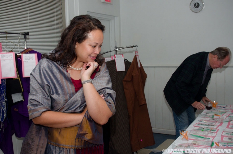 Guests browsing items at the silent auction at the Kabultec 2016 benefit dinner.